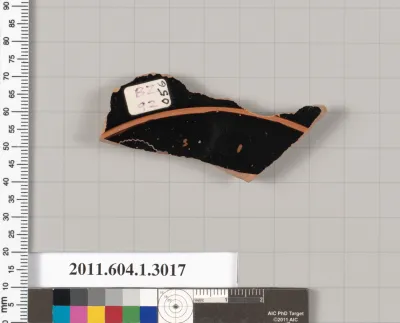 Terracotta fragment of a kylix (drinking cup)