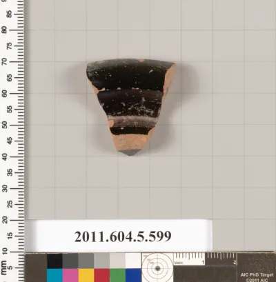 Terracotta fragment of a stemless kylix (drinking cup)