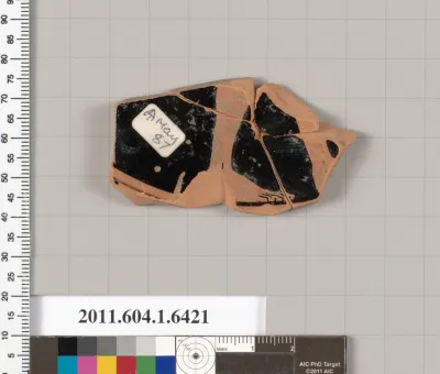 Terracotta fragment of a kylix (drinking cup)