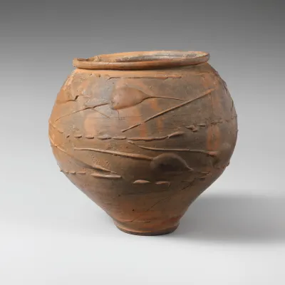 Terracotta beaker with barbotine decoration