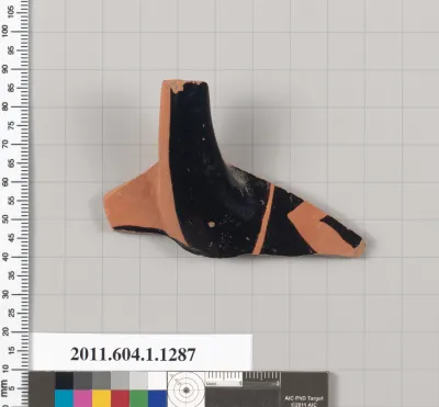 Terracotta fragment of a kylix (drinking cup)