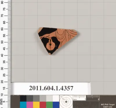 Terracotta fragment of a kylix (drinking cup)