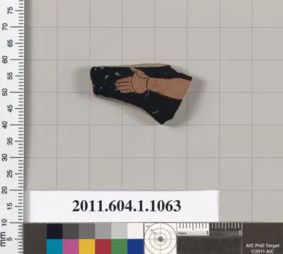 Terracotta fragment of a kylix (drinking cup)