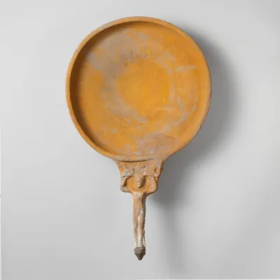 Terracotta patera (shallow bowl with handle)