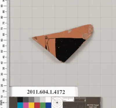Terracotta fragment of a kylix (drinking cup)