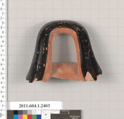 Terracotta fragment of a kylix (drinking cup)