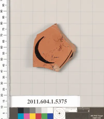 Terracotta fragment of a kylix (drinking cup)