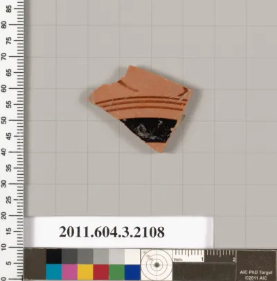 Terracotta fragment of a kylix (drinking cup)