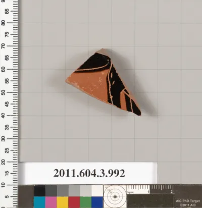 Terracotta fragment of a lekanis lid (covered dish)