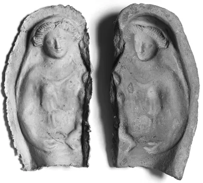 Mold of a Woman Holding a Child