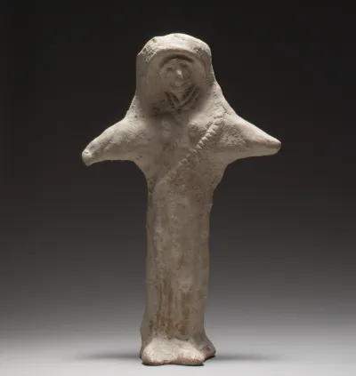 Standing female figurine (cruciform)