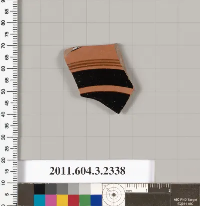 Terracotta fragment of a kylix: eye-cup (drinking cup)