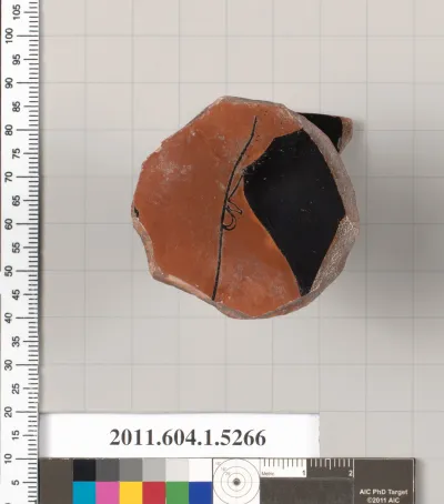 Terracotta fragment of a kylix (drinking cup)