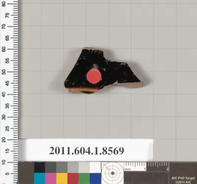 Terracotta fragment of a stemless kylix (drinking cup)