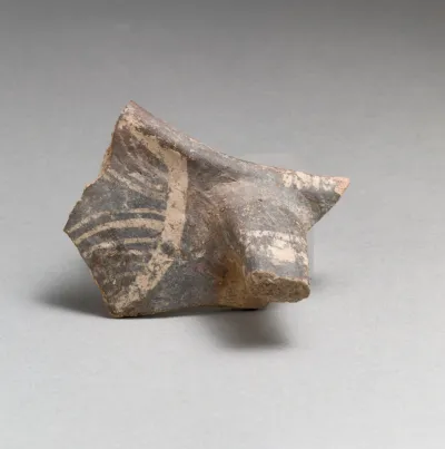 Terracotta rim and handle fragment from a jug