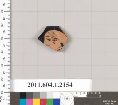 Terracotta rim fragment of a kylix (drinking cup)