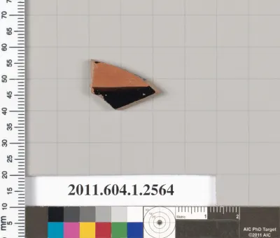 Terracotta fragment of a kylix (drinking cup)