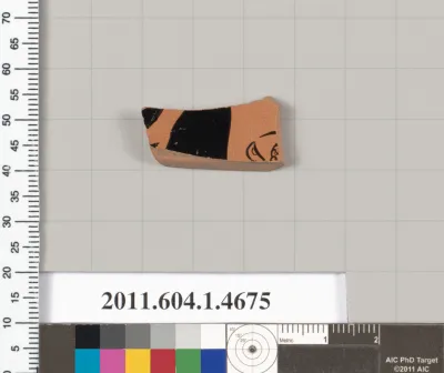 Terracotta fragment of a kylix (drinking cup)