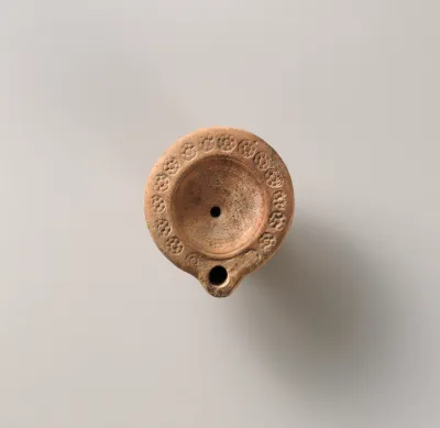 Terracotta oil lamp