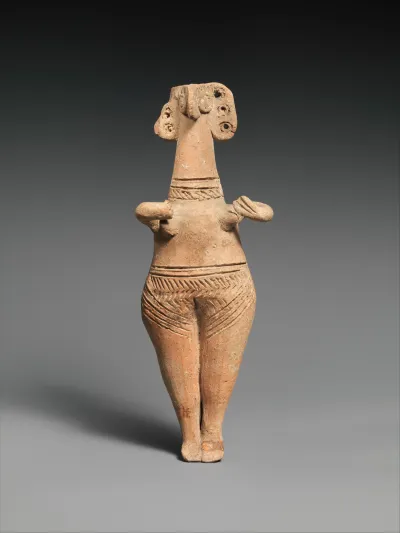 Terracotta statuette of woman with bird face