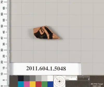 Terracotta fragment of a kylix (drinking cup)