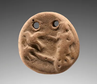 Loom weight with Aphrodite on a Dove-Driven Chariot