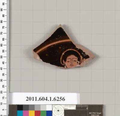 Terracotta fragment of a kylix (drinking cup)