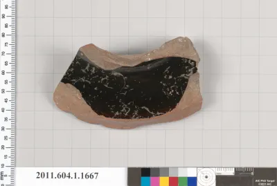 Terracotta fragment of a kylix (drinking cup)