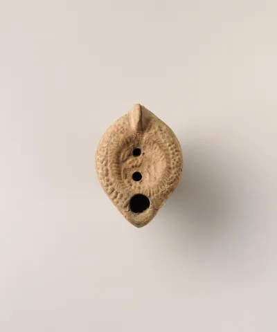 Terracotta oil lamp