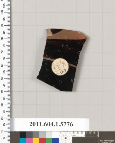 Terracotta fragment of a kylix: eye-cup  (drinking cup)