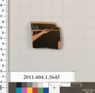 Terracotta rim fragment of a kylix (drinking cup)