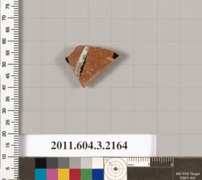 Terracotta fragment of a kylix (drinking cup)