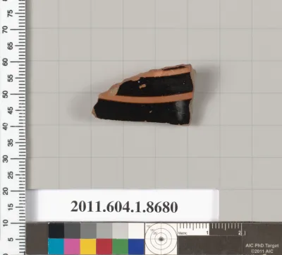 Terracotta fragment of a stemless kylix (drinking cup)
