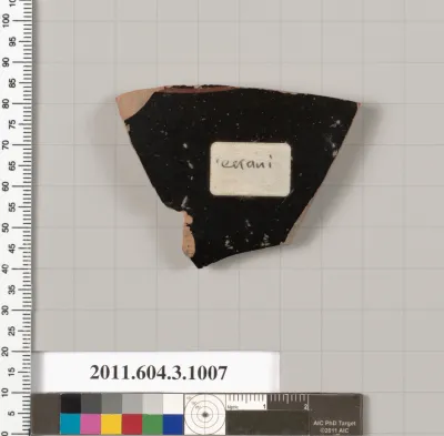Terracotta fragment of a lekanis lid (covered dish)
