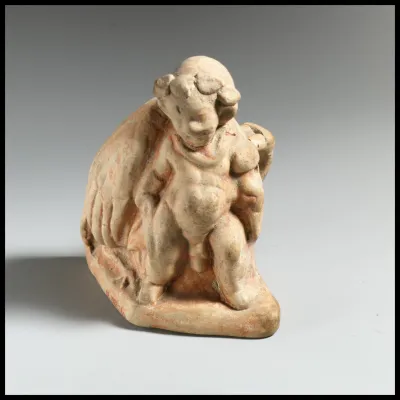Terracotta vase in the form of a pygmy carrying a dead crane