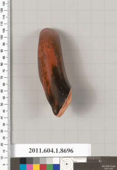 Terracotta fragment of a stemless kylix (drinking cup)