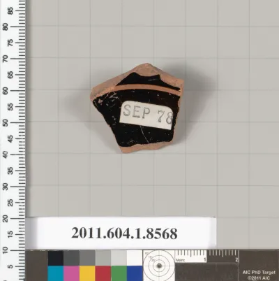 Terracotta fragment of a stemless kylix (drinking cup)