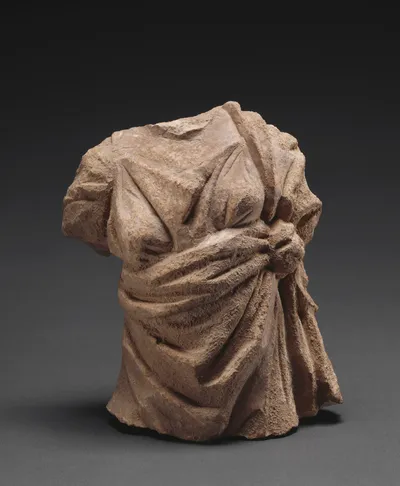 Fragment of a Female Figure from a Funerary Building