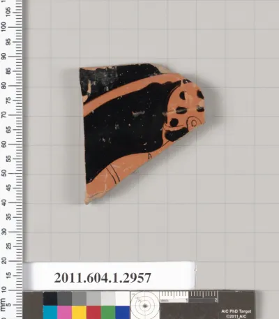 Terracotta fragment of a kylix (drinking cup)