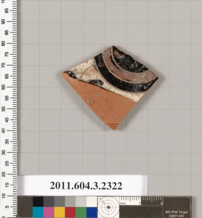 Terracotta fragment of a kylix: eye-cup (drinking cup)