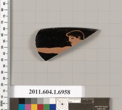 Terracotta rim fragment of a kylix (drinking cup)