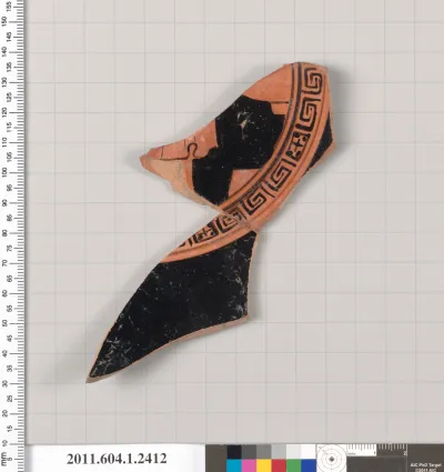 Terracotta fragment of a kylix (drinking cup)