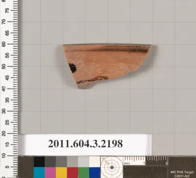 Terracotta rim fragment of a kylix (drinking cup)