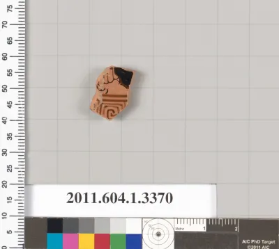 Terracotta fragment of a kylix (drinking cup)