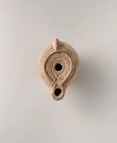Terracotta oil lamp