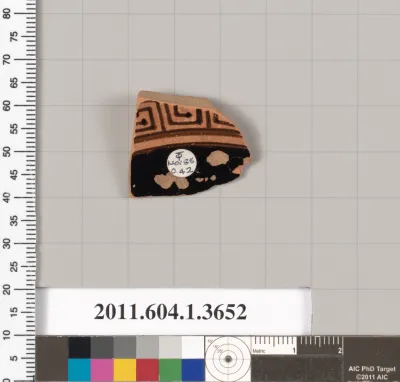 Terracotta fragment of a kylix (drinking cup)