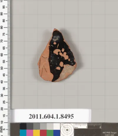 Terracotta fragment of a stemless kylix (drinking cup)