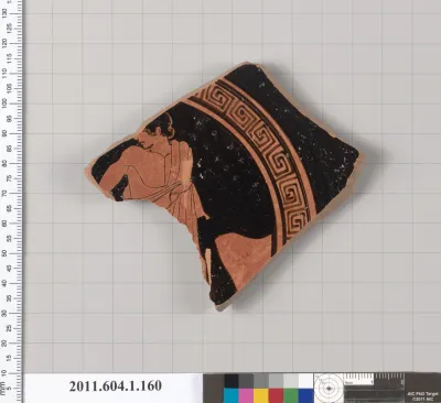 Terracotta fragment of a kylix (drinking cup)