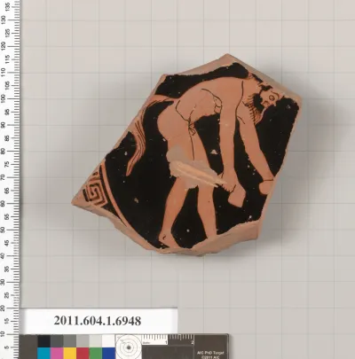 Terracotta fragment of a kylix (drinking cup)