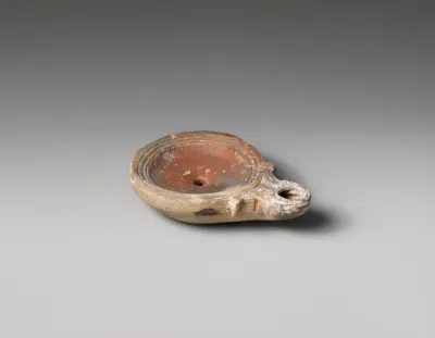 Terracotta oil lamp